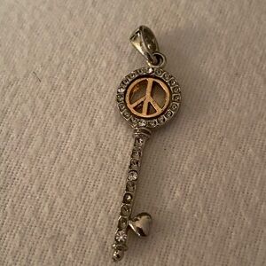 Beautiful two tone key crystal peace pendant